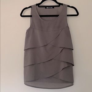 Against Nudity grey blouse